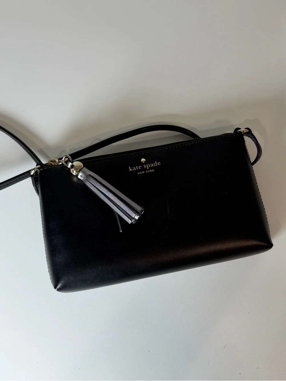 kate spade Like New New York Ivy Street Black Leather Crossbody Bag with Tassel